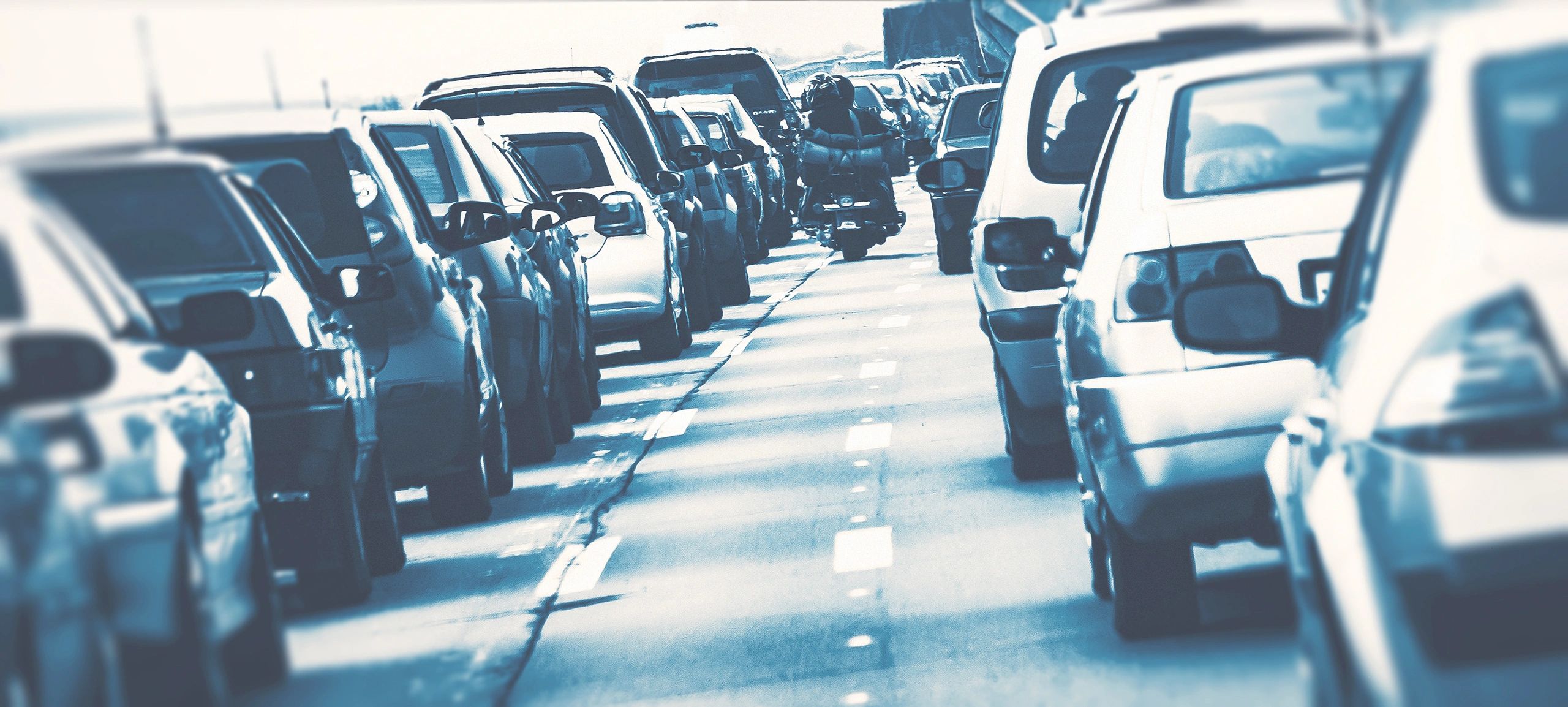 Highway traffic at dusk representing nationwide routing