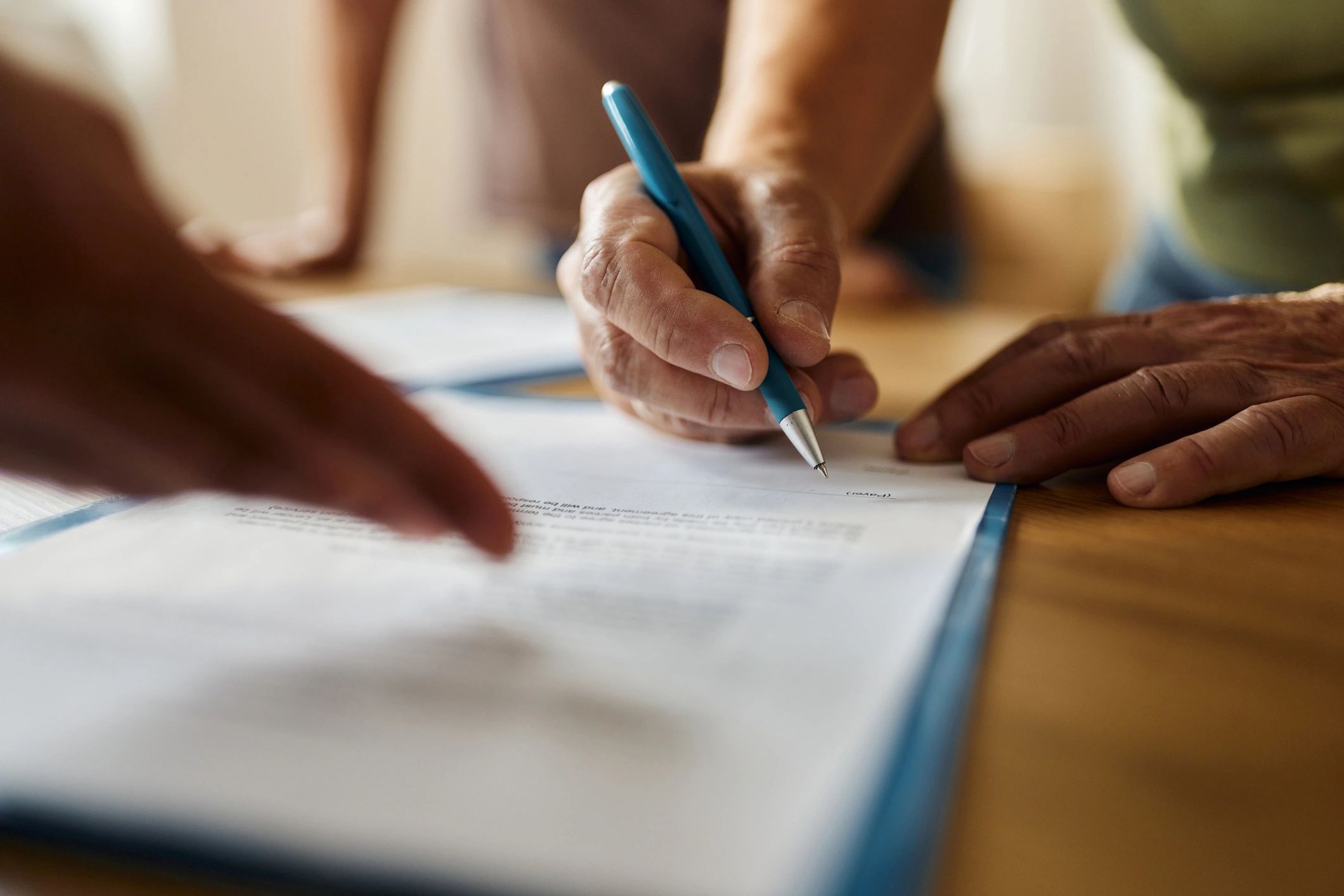 Close-up of transport documentation being completed and signed