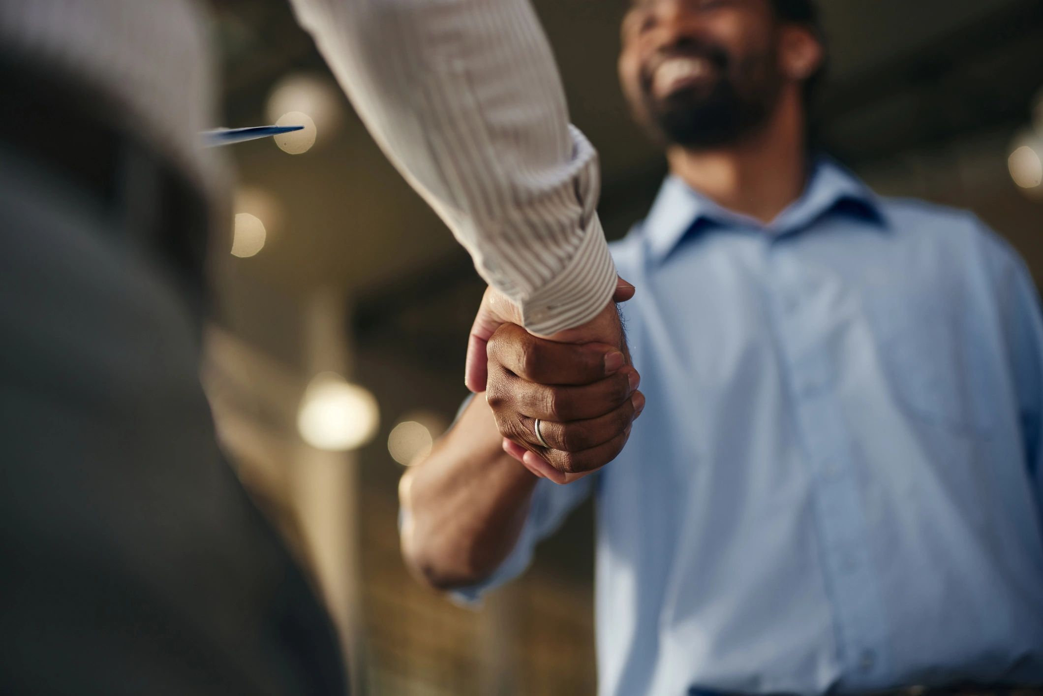 Handshake representing a professional service agreement